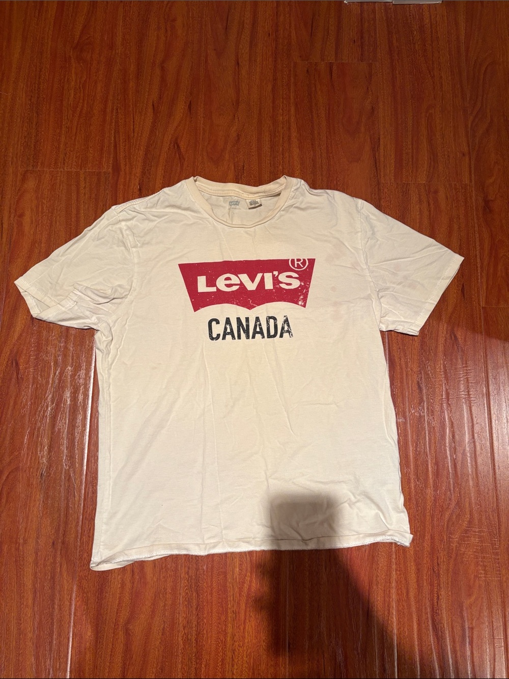 Levi's Cream Short-Sleeve Graphic Tee with Red Logo